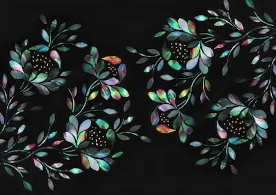 Raden is a lacquerware technique using shell inlay, creating shimmering patterns on urush.