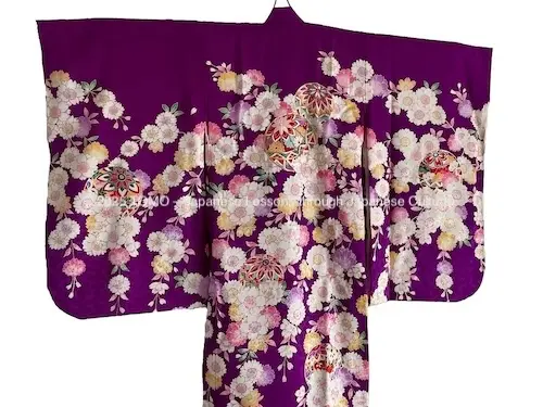 Purple kimono for a three-year-old girl, worn for the Shichi-Go-San celebration.